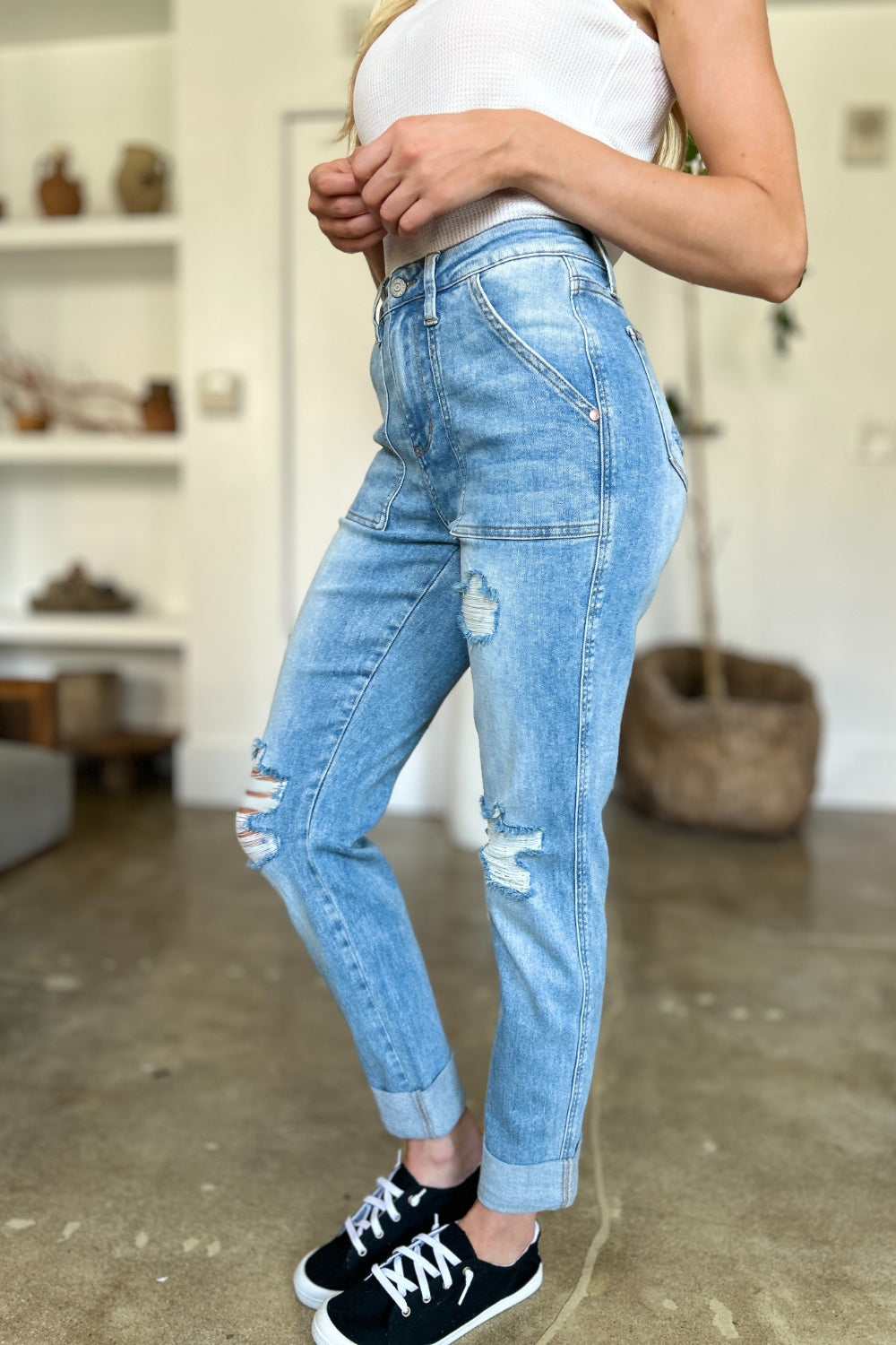 Judy Blue Full Size Distressed Straight Jeans with Patch PocketsThese distressed straight jeans feature stylish patch pockets for added flair. The distressed detailing adds a trendy touch to your look. The straight cut offers a f