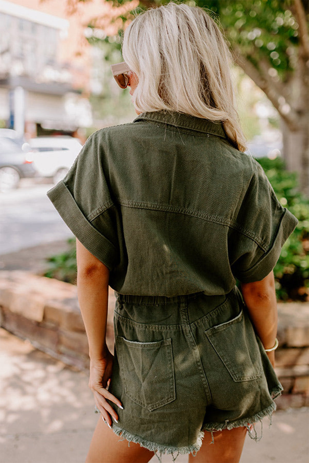 Moss Green Distressed Frayed Denim RomperMaterial:98%Cotton+2%Elastane

• This romper offers a comfortable and stretchy fit for all-day wear.
• The moss green hue brings a touch of nature-inspired charm, 