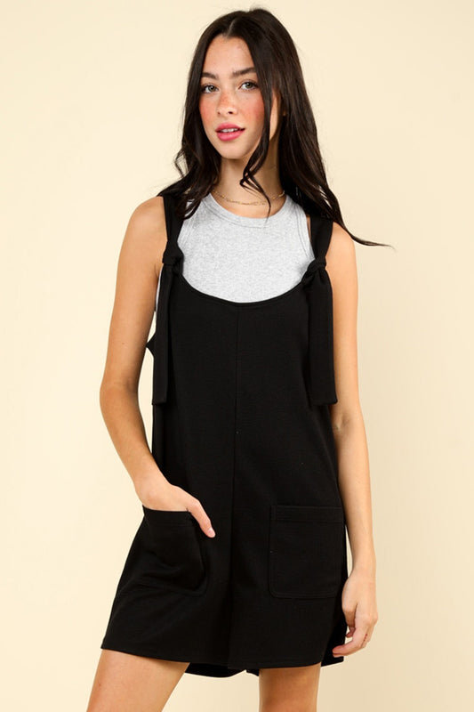 VERY J Tie Shoulder Front Pocket RomperThe Solid Casual Knit Romper is a chic and comfortable choice for any casual occasion. This romper features front patch pockets for added convenience and a trendy to