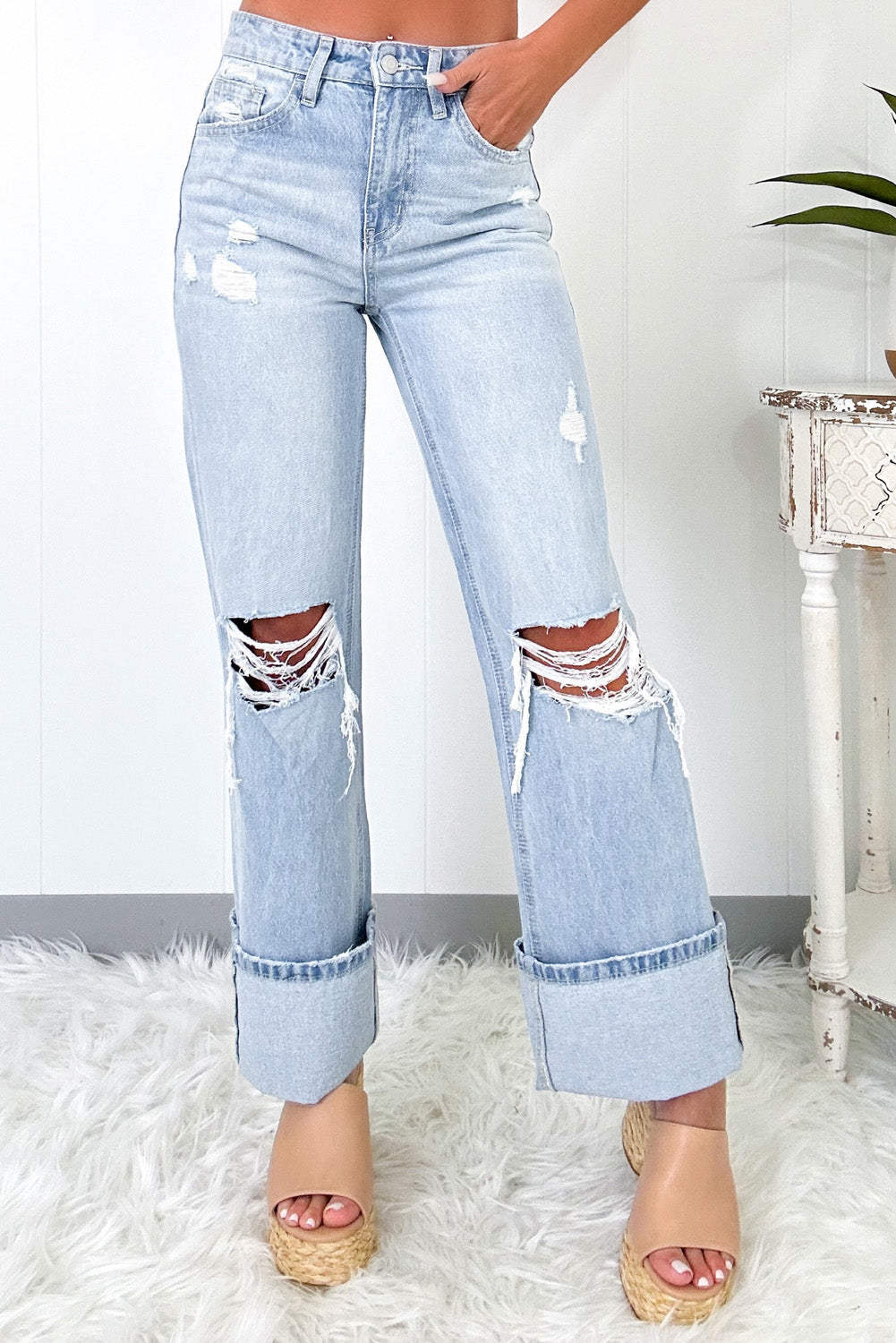 Beau Blue Light Wash Distressed Flare JeansMaterial:93%Cotton+5%polyester+2%Elastane

• The jeans are designed for comfort and style, perfect for everyday wear.
• The high waist design of these jeans provid