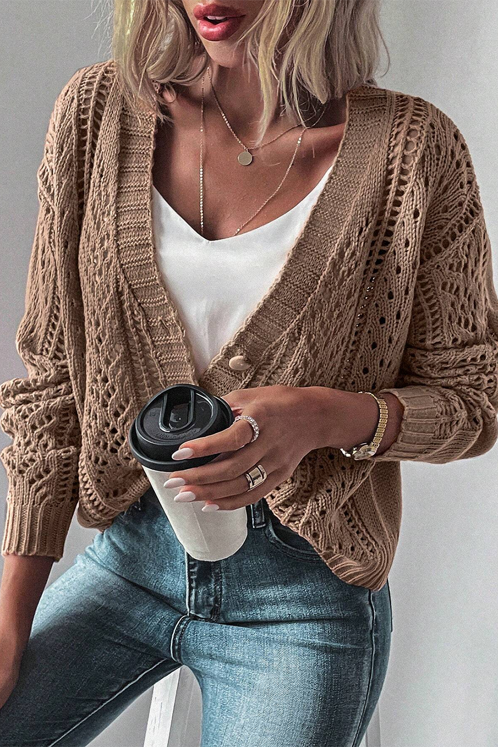 Real Teal Hollow Knit Drop Shoulder CardiganMaterial:60%Cotton+40%Acrylic

• Elevate your casual wardrobe with the cardigan, crafted for comfort and style, ideal for layering during transitional seasons.
• T