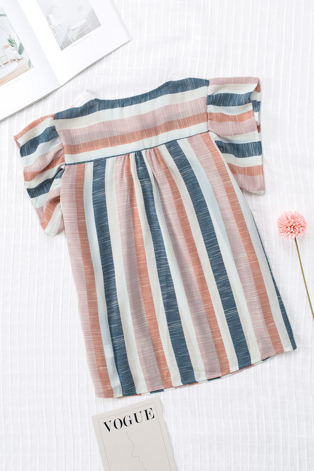 Pink and Blue Stripes Shirt Flutter Sleeve V Neck BlouseMaterial:100%Polyester


	•This simple striped print top looks very stylish and casual, and you'll get a lot of compliments wearing it 


	•Drawstring neckline 