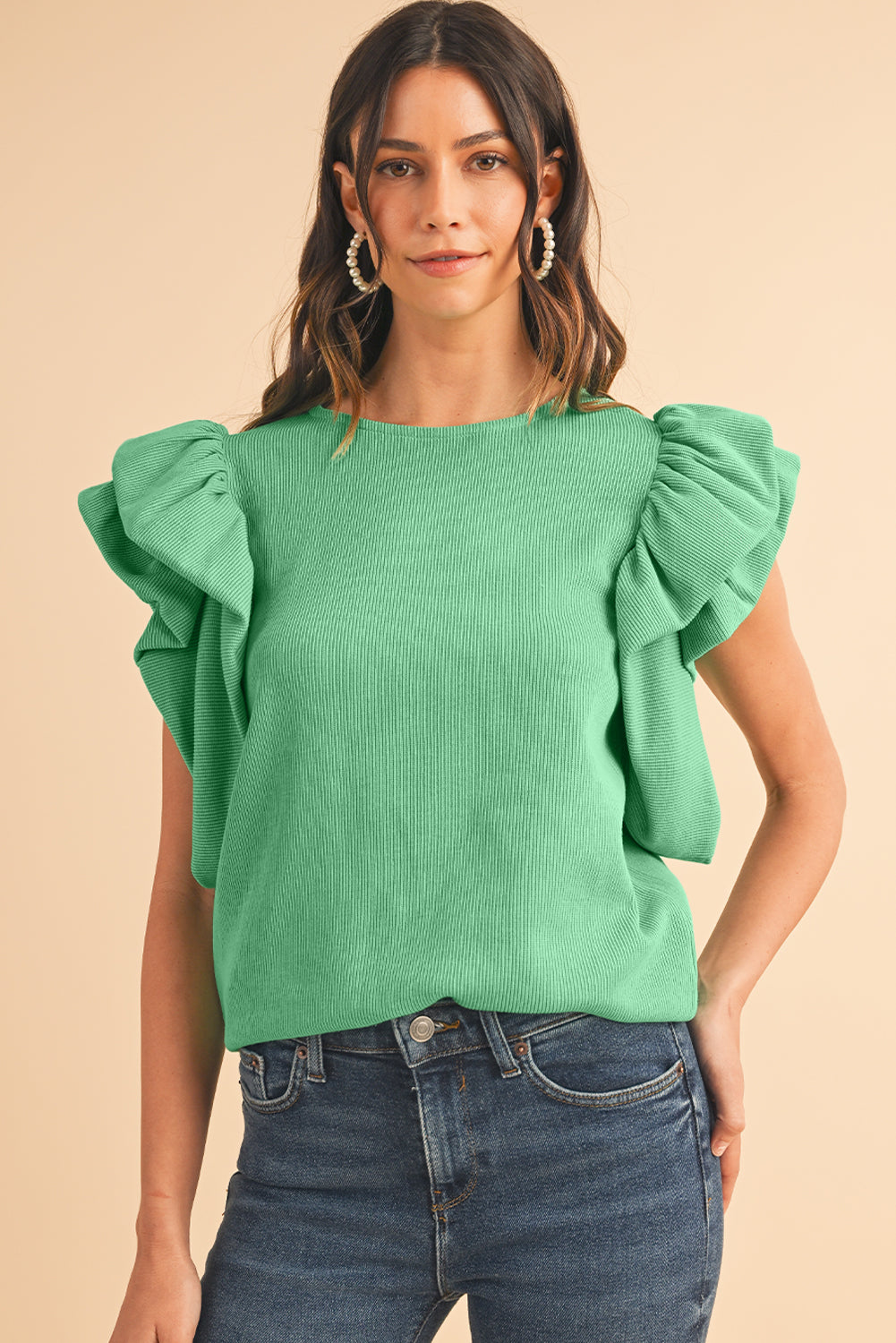 Green Solid Color Ruffle Sleeve Ribbed BlouseMaterial:65%cotton+33%polyester+2%Elastane



		The blouse features ruffle sleeves, which add a playful and romantic touch to the overall design. 
	
	
		The sol