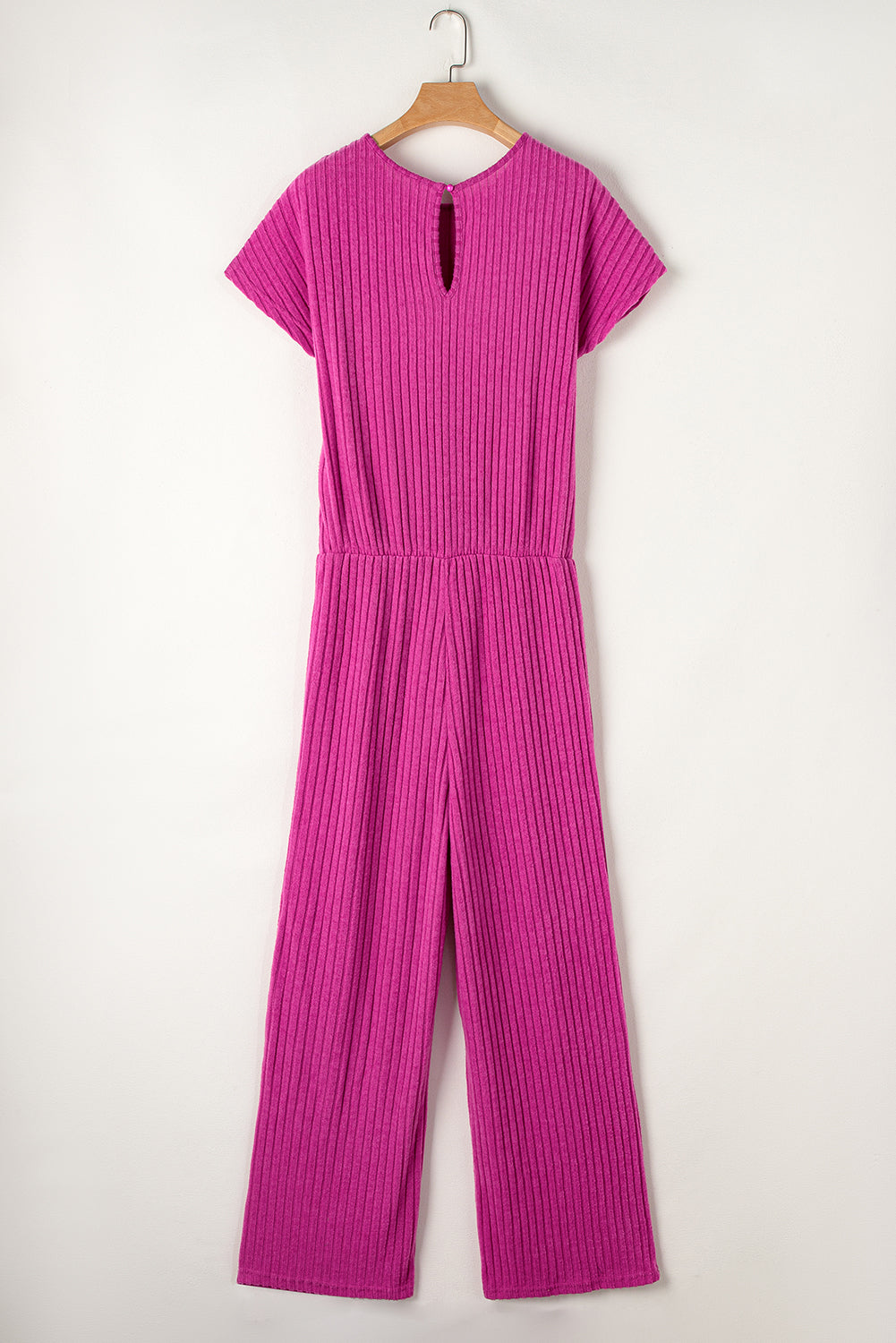 Grass Green Solid Color Ribbed Short Sleeve Wide Leg JumpsuitMaterial:85%Polyester+10%Viscose+5%Elastane



		The jumpsuit is a versatile and trendy one-piece outfit, featuring a solid color design that offers a sleek and mi