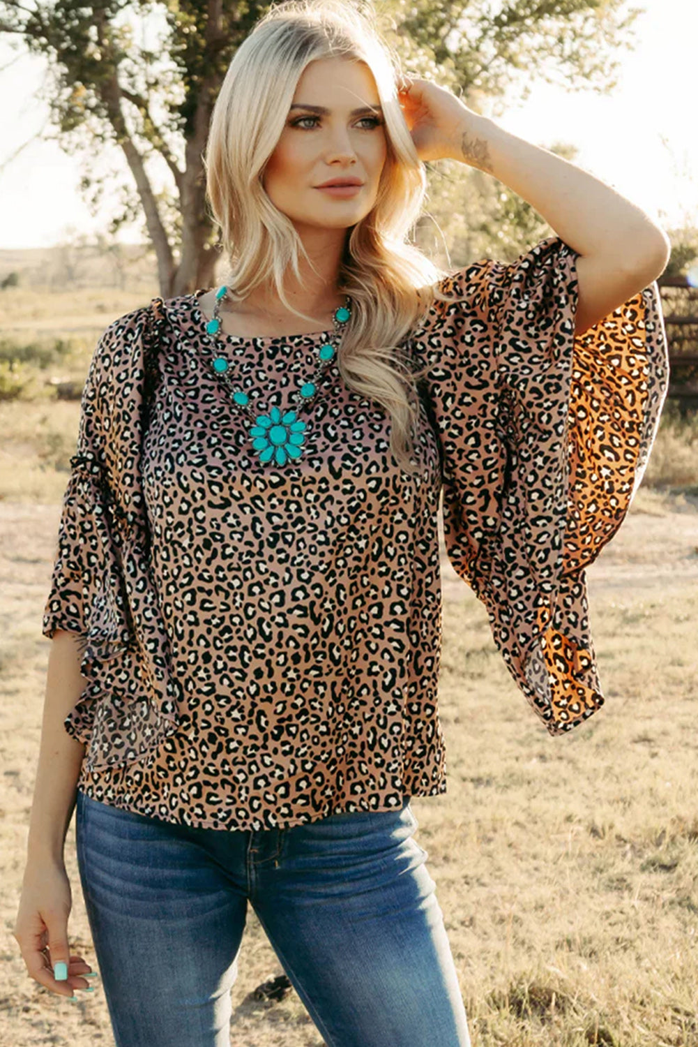 Chestnut Leopard Ruffle Flounce Sleeve BlouseMaterial:97%Polyester+3%Elastane



		The blouse is a stylish and feminine top featuring a trendy leopard print and flounce sleeves, adding a touch of flair to you