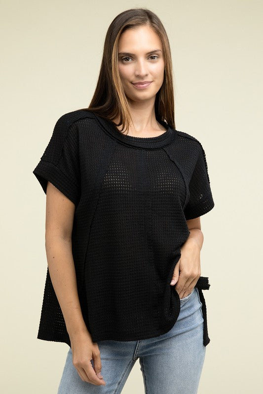 Brushed Waffle Exposed-Seam Short Sleeve TopElevate your casual wardrobe with this Brushed Waffle Top, featuring side slits, exposed seam details, and a stylish hi-low hem. Perfect for a relaxed yet trendy loo