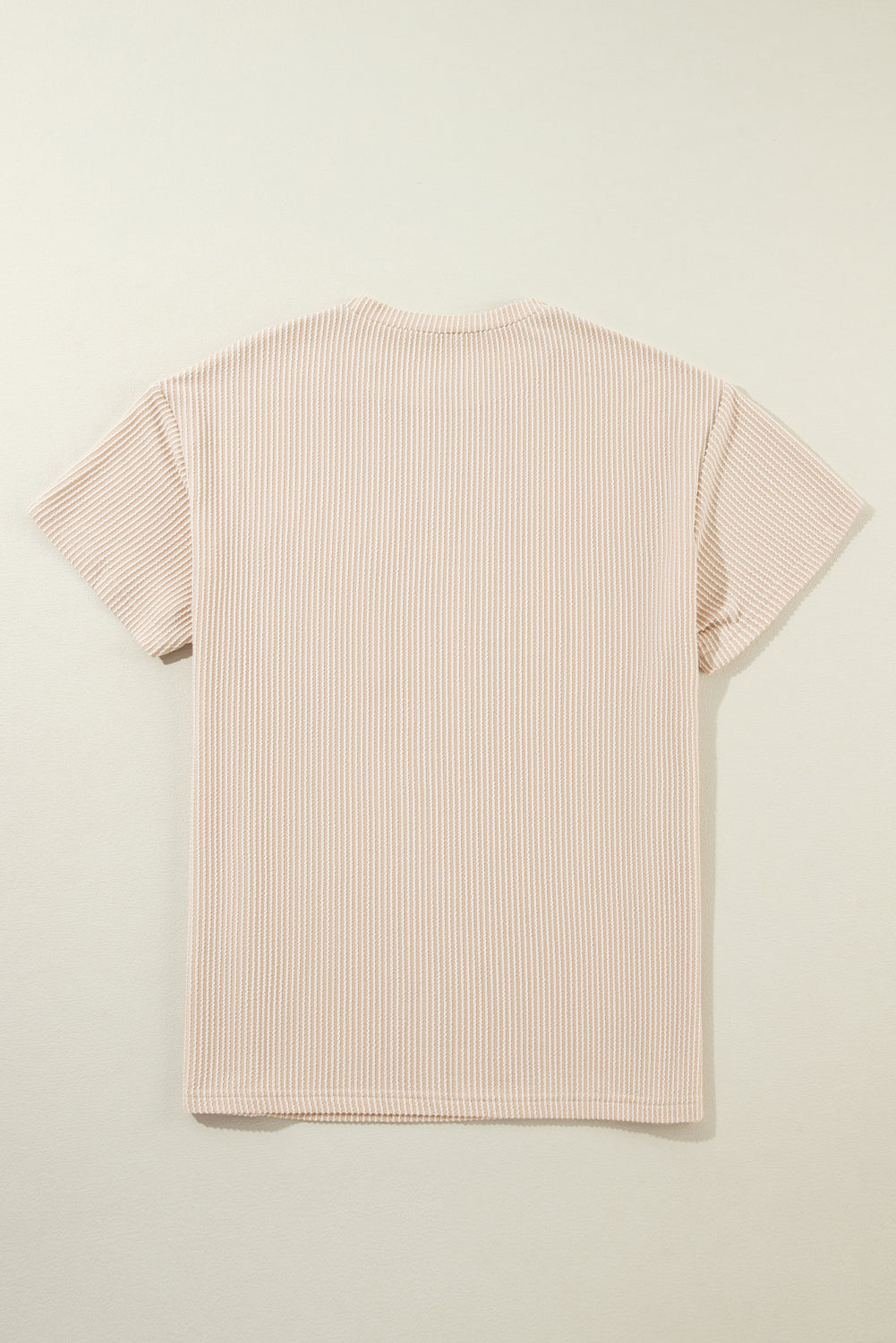 Pink Crinkle Rib Knit Pocketed Loose Fit Crew Neck T ShirtMaterial:75%Polyester+20%Viscose+5%Elastane

• Pink T Shirt offers a charming, feminine touch with its soft pink color and crinkle rib texture, perfect for a casual