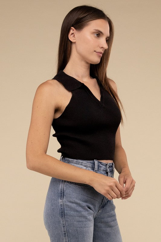 Sleeveless Collared Crop Knit TopThe Sleeveless Collared Crop Knit Top exudes timeless elegance and sophistication. Its tailored design features a classic collared neckline, adding a touch of refine