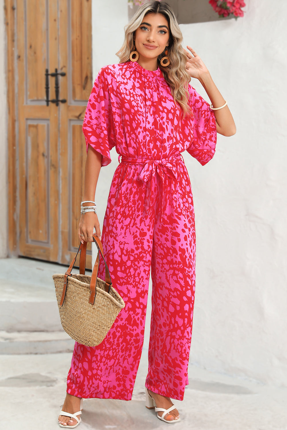 Rose Leopard Print Tulip Sleeve Belted Wide Leg JumpsuitMaterial:100%Polyester



		The jumpsuit features a trendy leopard print pattern, adding a bold and fashionable touch to your wardrobe.
	
	
		With its flounce s