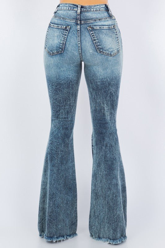 Storm Bell Bottom JeanThese Bell Bottom Jeans are crafted with a premium soft stretch fabric for superior comfort and style. Featuring 34" inseam length, frayed hem detail, rip details, f