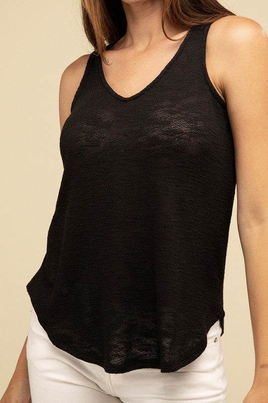 V Neck Sleeveless Cami TopThe V Neck Sleeveless Cami Top is a chic and versatile addition to any wardrobe. Featuring a flattering V neckline and a sleeveless design, this cami top is perfect 