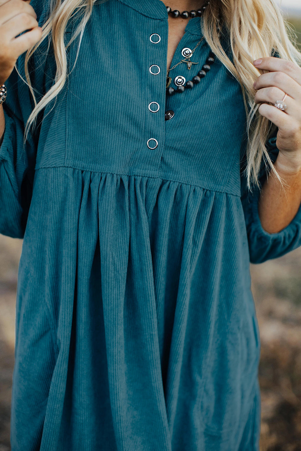 Light Blue Snap Button Empire Waist Lantern Sleeve Corduroy DressMaterial:100%Polyester

• Effortlessly chic, the mini dress exudes laid-back elegance with its soothing color and relaxed fit. 
• The soft corduroy fabric of this 