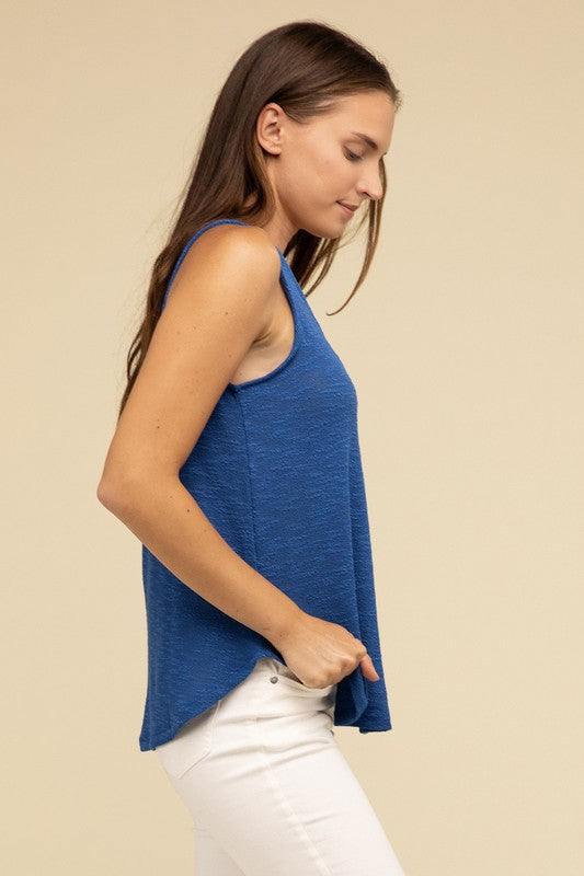 V Neck Sleeveless Cami TopThe V Neck Sleeveless Cami Top is a chic and versatile addition to any wardrobe. Featuring a flattering V neckline and a sleeveless design, this cami top is perfect 