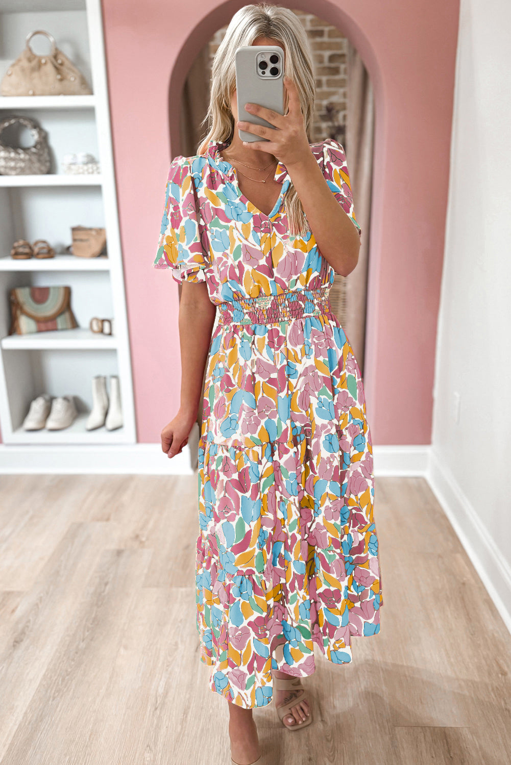 Rose Floral Flounce Sleeve Smocked Waist Tiered Maxi DressMaterial:100%Polyester

• Exude bohemian elegance in this maxi dress, featuring a smocked waist for a flattering silhouette.
• The tiered design adds a whimsical t