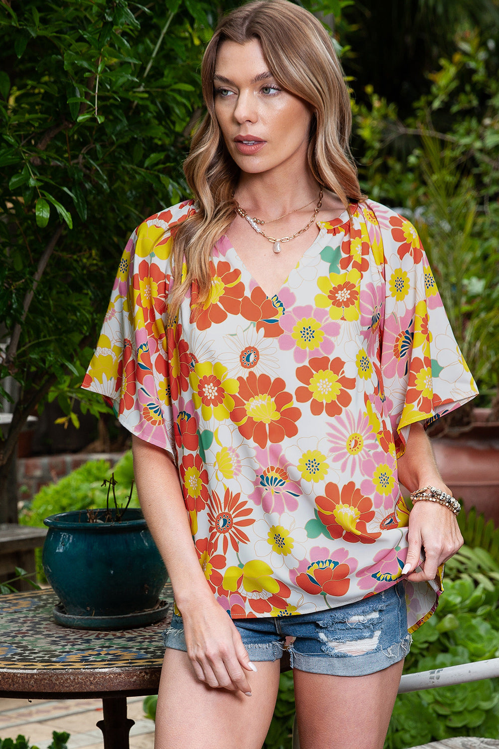 Multicolor Abstract Print Flutter Sleeve V Neck BlouseMaterial:100%Polyester



		Flutter sleeves for a feminine touch.
	
	
		V-neckline adds a flattering silhouette.
	
	
		Lightweight and breathable fabric for 