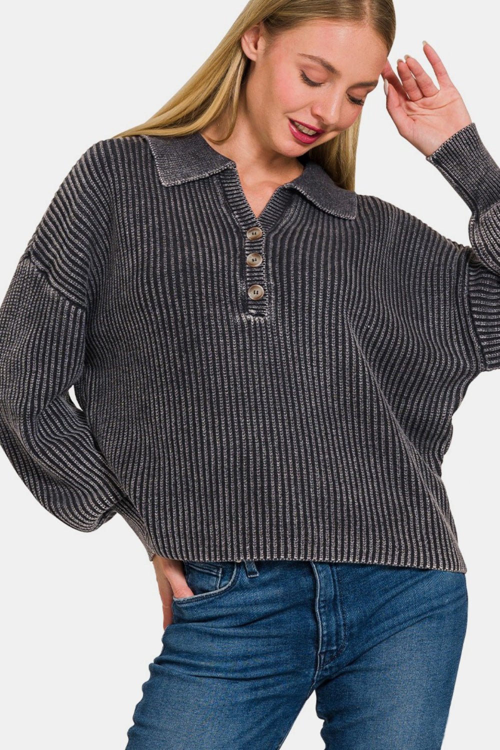 Zenana Washed Half Button Long Sleeve SweaterAdd a touch of casual sophistication to your wardrobe with this Washed Half Button Long Sleeve Sweater. The half button design gives it a unique and stylish look tha