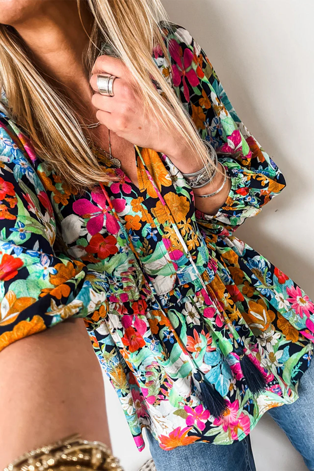 Multicolour Boho Floral V Neck Lantern Sleeve BlouseMaterial:100%Polyester

• Embrace boho-chic vibes with our blouse, featuring vibrant hues and a tie front design for a stylish look.
• The lantern sleeves add a to