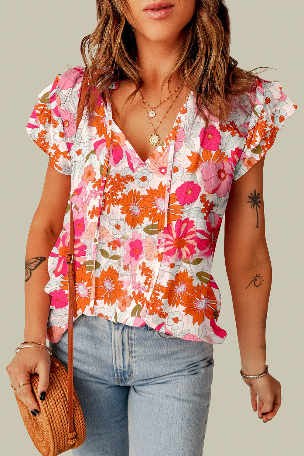 Multicolor Floral Print Ruffled Sleeve Split V Neck Peasant TopMaterial:100%Viscose



		•Perfect for boutiques and retailers.
	
	
		•Easy to wear and comfortable.
	
	
		•Features a trendy and stylish design.
	
	
		•I