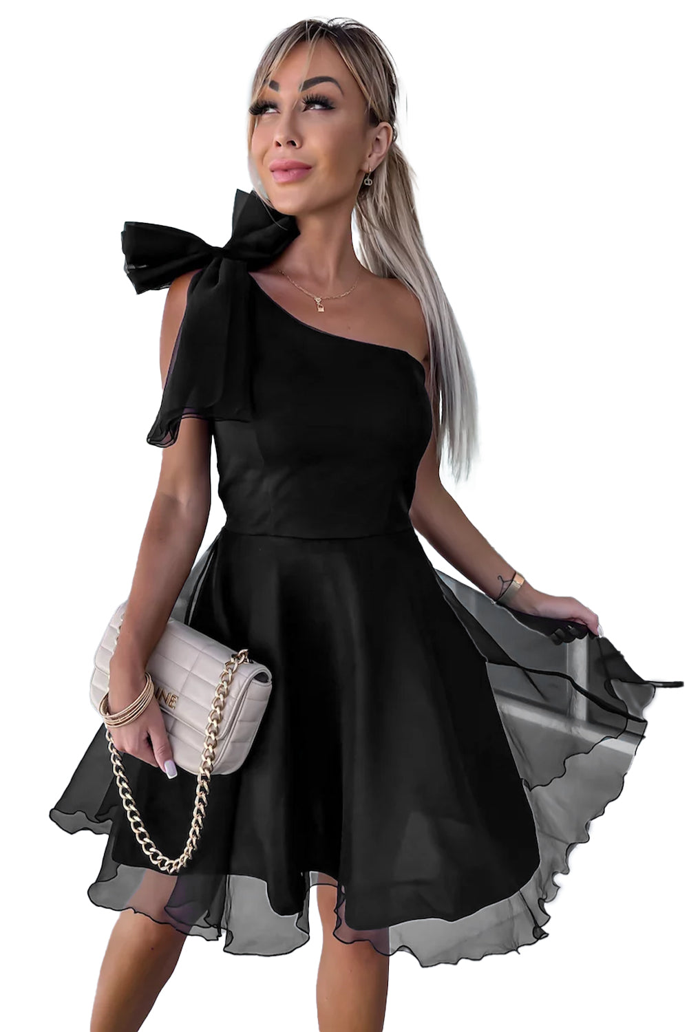 Black Bowtie One Shoulder Tulle Overlay Skater DressMaterial:92%Polyester+8%Elastane

• Stand out in the crowd with the chic dress, featuring a stylish one-shoulder design for a modern twist on a classic silhouette.
