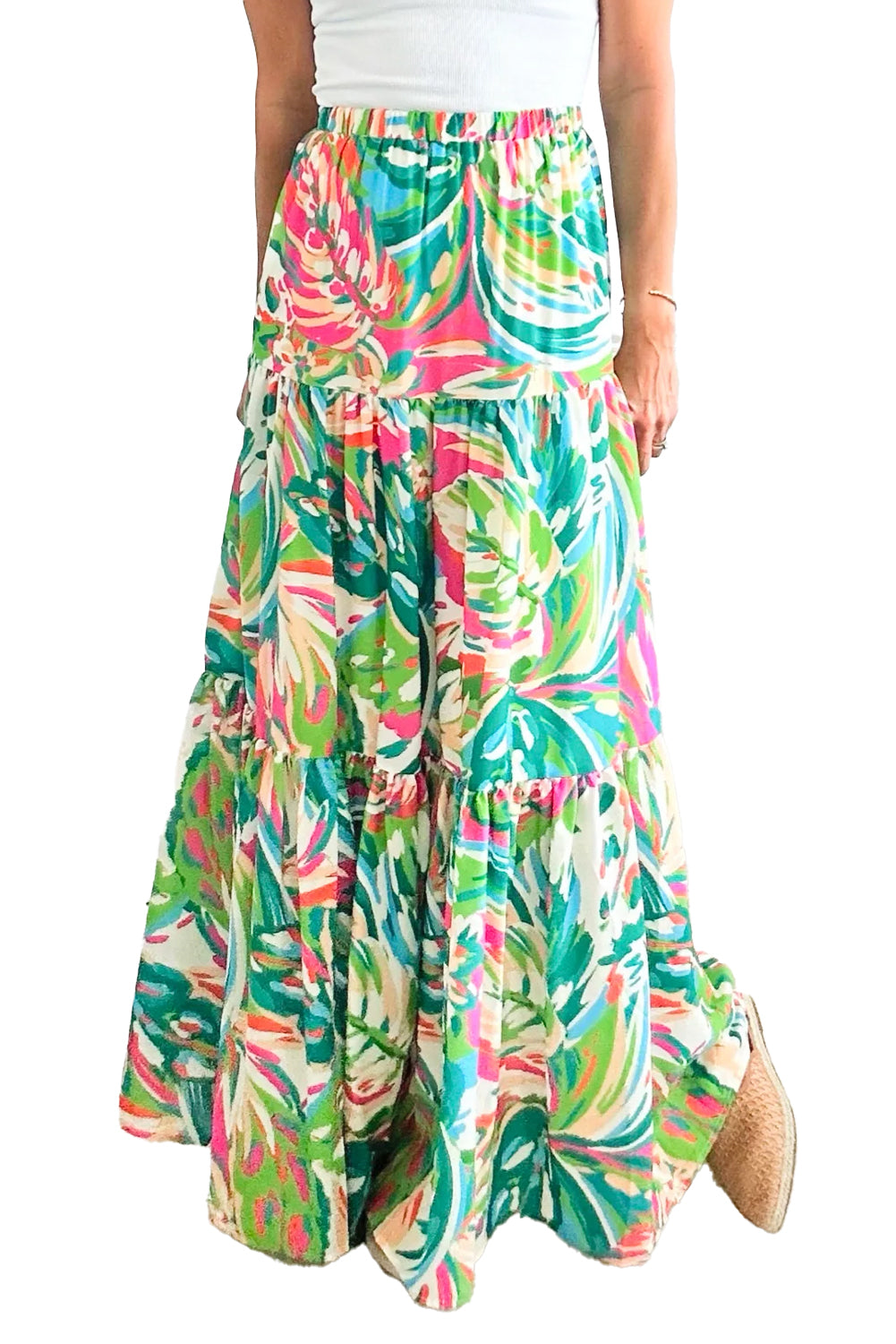 Green Abstract Printed High Waist Tiered Maxi SkirtMaterial:100%Polyester

• Stand out in style with this skirt, perfect for a fun vacation look with its vibrant color and eye-catching design.
• The high waist desi