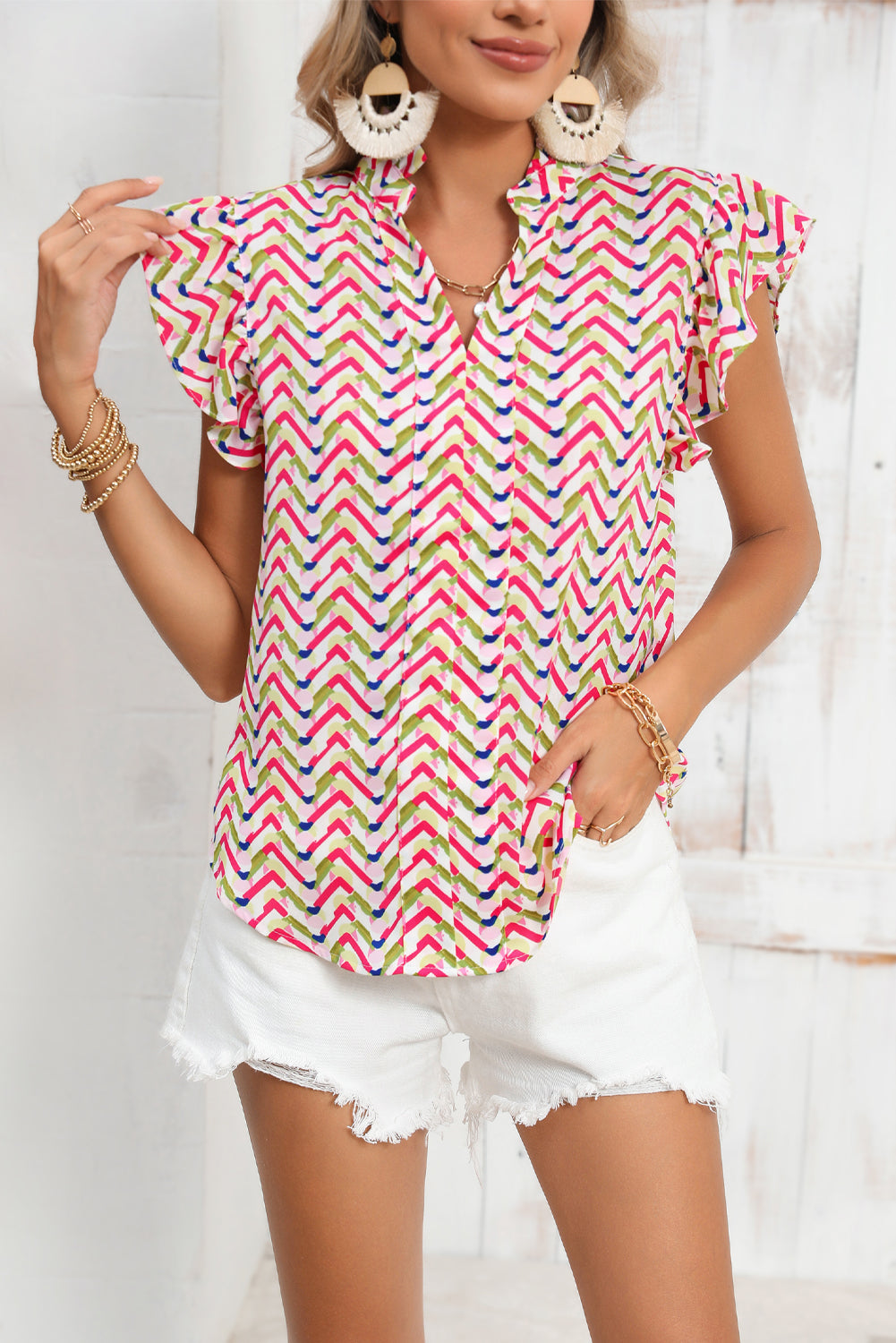 Multicolor Chevron Print Frill V Neck Ruffle BlouseMaterial:100%Polyester



		Be a style icon in this printed blouse
	
	
		This stylish top is featured with chevron print all over
	
	
		It has a ruffled notc