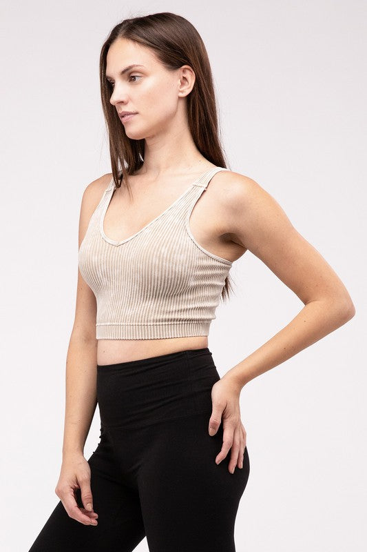 Washed Ribbed Cropped V-Neck Tank TopThe Washed Ribbed Cropped V-Neck Tank Top offers a stylish and comfortable option for your wardrobe. Made from ribbed fabric with a washed finish, it exudes a casual