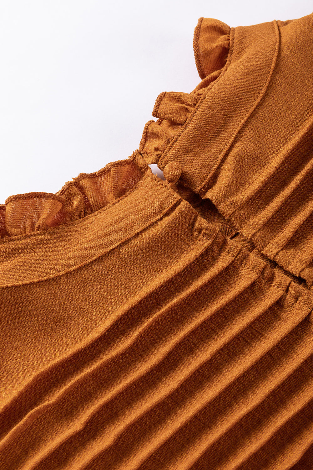 Camel Ruffle Solid Color Pleated Smocked Long Sleeve BlouseMaterial:50%Viscose+28%Polyester+22%Polyamide



		The blouse is made of high-quality fabric that is comfortable to wear and easy to maintain.
	
	
		The ruffled