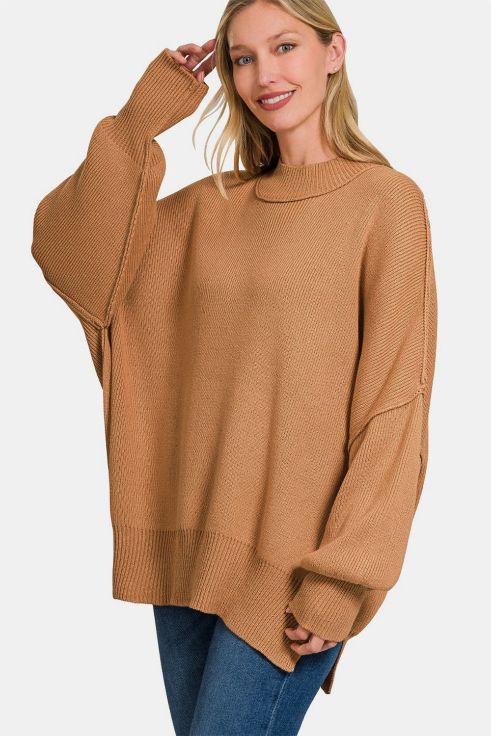 Zenana Side Sit Oversize SweaterSide Slit Oversize Sweater is a trendy and comfortable choice for your casual wardrobe. The oversized fit adds a relaxed and effortless vibe to your outfit. With sid