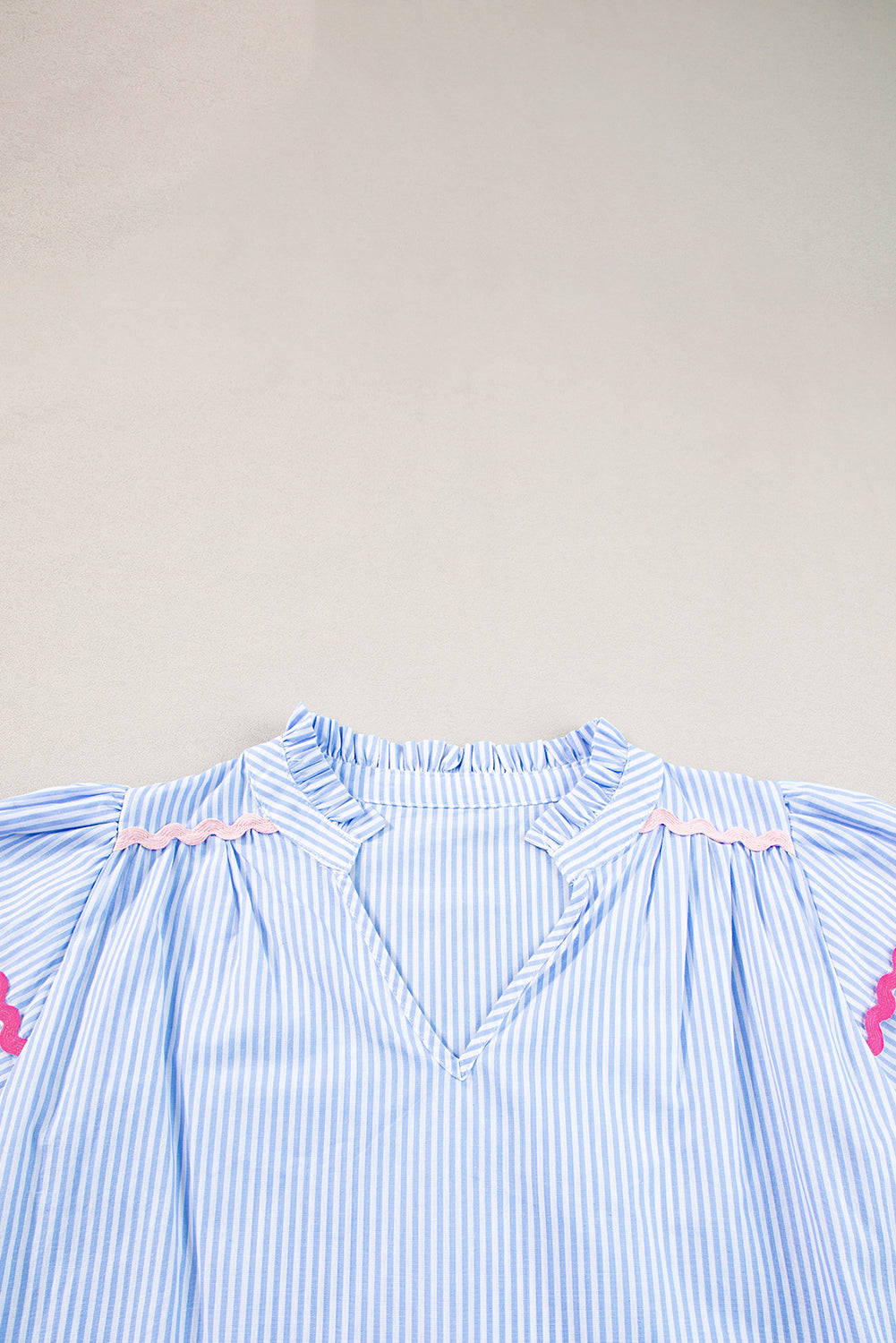 Sky Blue Striped Ricrac Splicing Frill V-Neck BlouseMaterial:100%Cotton



		Playful stripes: This blouse features a fun striped pattern with flirty frill details and a flattering V-neck.
	
	
		Chic and charming: