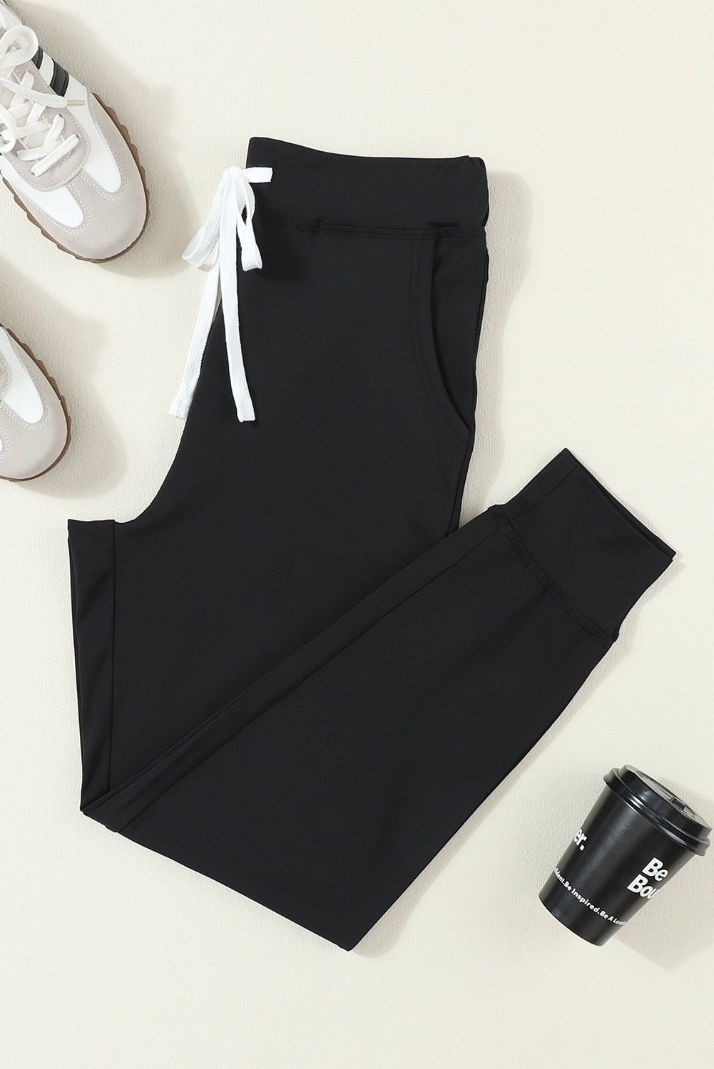 Black Casual Drawstring Drop Waist Pocketed JoggersMaterial:90%Polyester+10%Elastane



		Black can easily be paired with different tops and shoes, making it a go-to option for various outfits.
	
	
		The drawstr