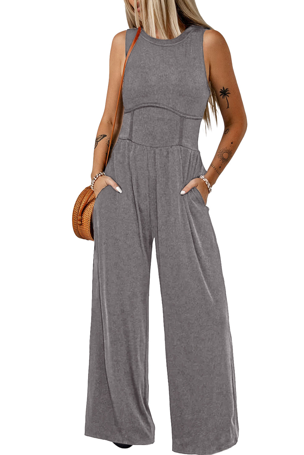 Blackish Green Sleeveless High Waist Wide Leg JumpsuitMaterial:93%Viscose+7%Elastane



		The jumpsuit features a sleeveless design, meaning it does not have sleeves and exposes the arms. 
	
	
		The jumpsuit has a 