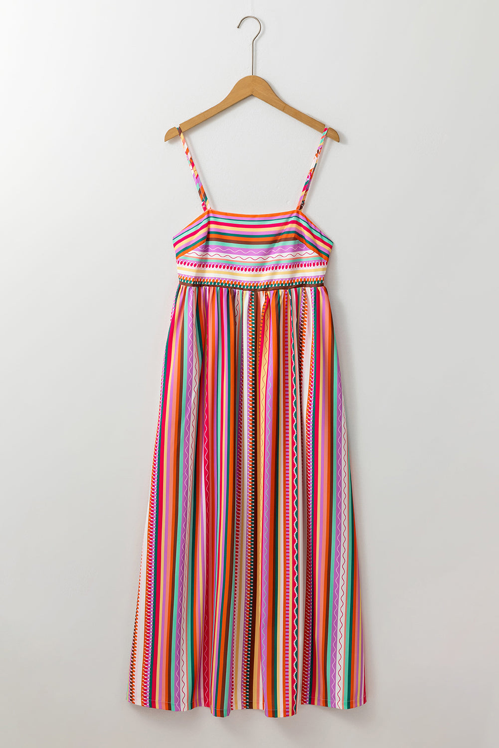 Multicolour Boho Striped Spaghetti Strap Smocked Back Maxi DressMaterial:100%Polyester

• Embrace a vibrant blend of colors in this maxi dress, perfect for daily wear with its relaxed, sleeveless design.
• The shirred back ensu