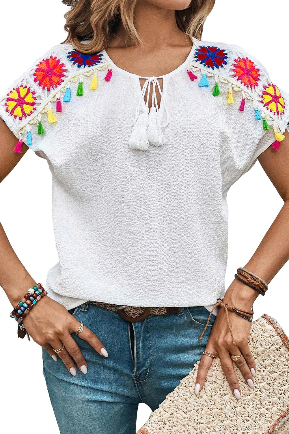 White Boho Embroidered V Neck Fringe Short Sleeve BlouseMaterial:97%Polyester+3%Elastane



		The blouse is crafted from a soft and breathable fabric, providing comfort and allowing for easy movement.
	
	
		This blou