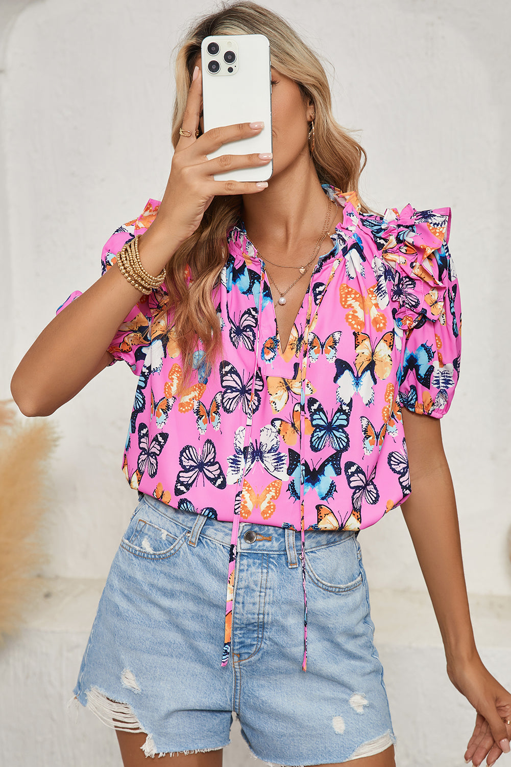 Purple Butterfly Print Frill V Neck Puff Sleeve BlouseMaterial:100%Polyester



		 Fluttery and fabulous: This blouse features a whimsical butterfly print, a flattering V-neck, playful frill details, and romantic puff