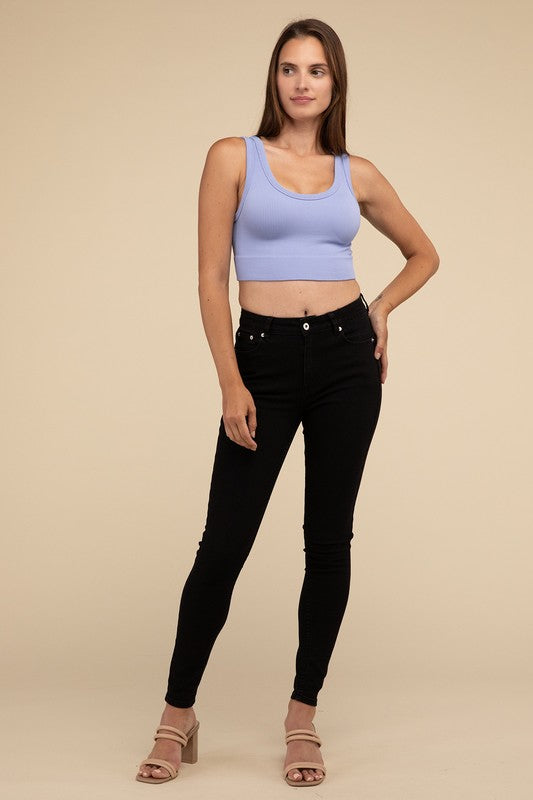 Ribbed Seamless Crop TopElevate your summer essentials with our Ribbed Seamless Crop Top, a versatile piece perfect for layering or wearing solo. Crafted with comfort in mind, it boasts a f