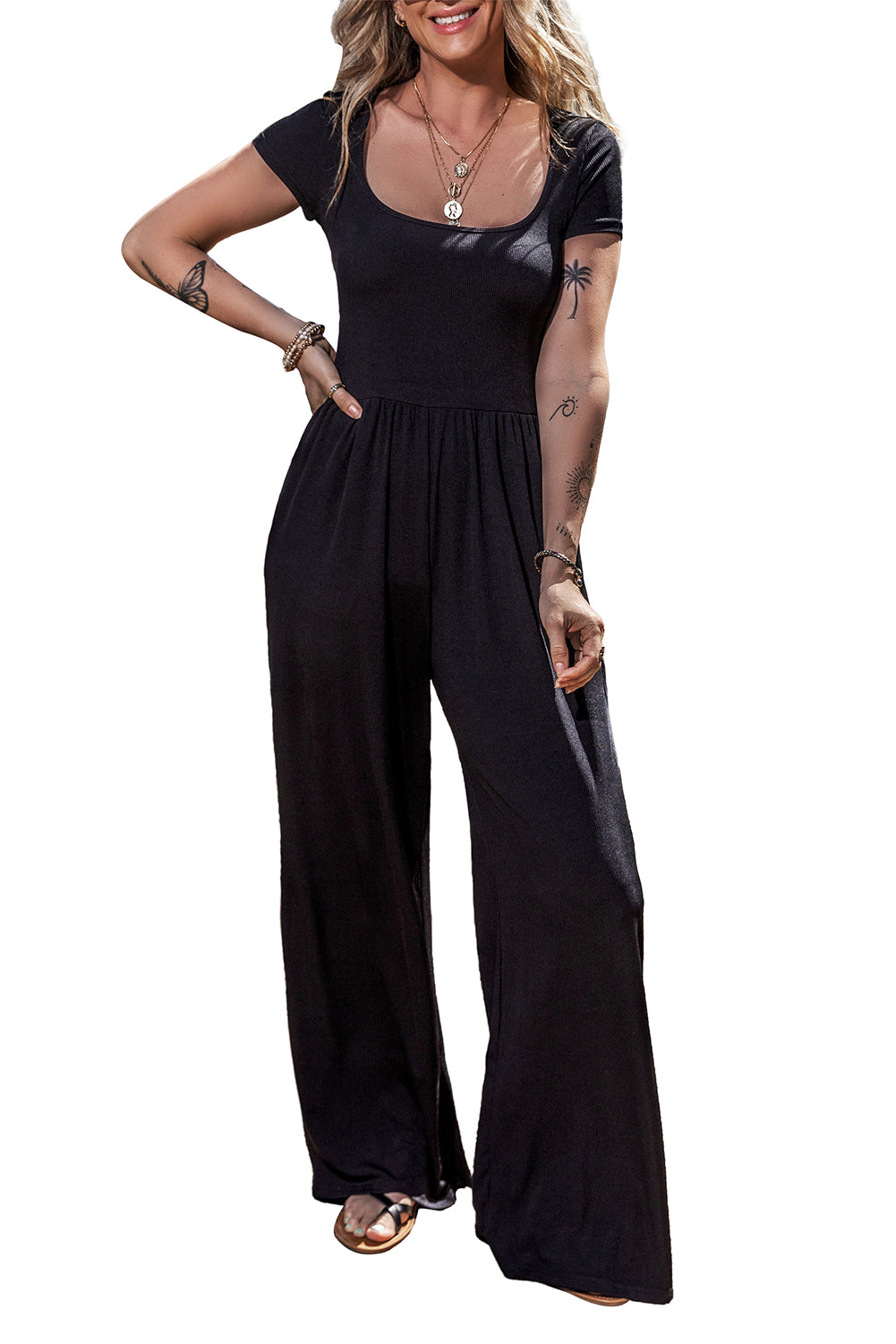 Black Pleated High Waist U Neck Short Sleeve JumpsuitMaterial:95%Polyester+5%Elastane

• Elevate your night club look with this chic black jumpsuit featuring a flattering high waist design and stylish pleats that effo