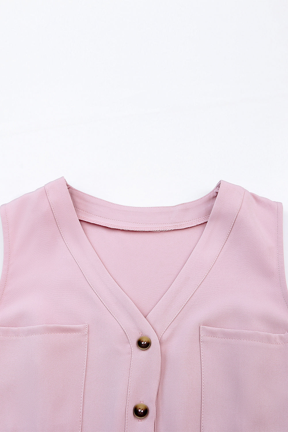 Pink Buttoned Sleeveless Cropped Jumpsuit With SashMaterial:95%POLYESTER+5%ELASTANE



		The
chic jumpsuit features a button-up front and a sleeveless design, making it
perfect for warm weather
	
	
		The
crop