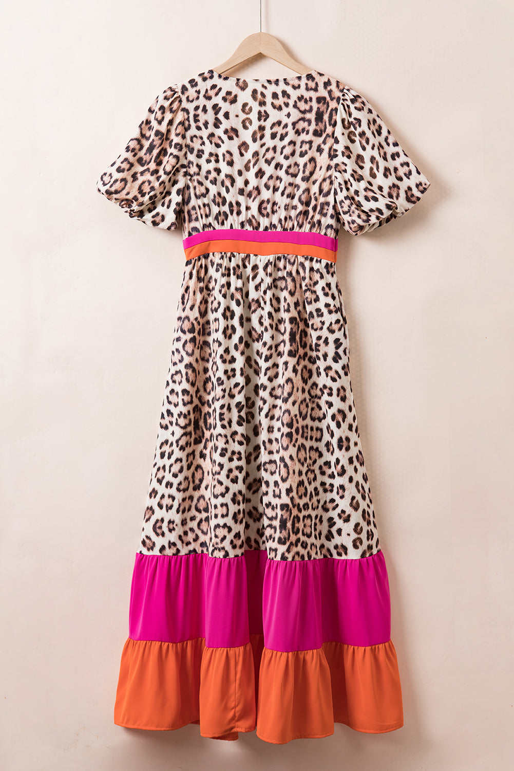 Bright Pink V-neck Leopard Print Colorblock Maxi DressMaterial:100%Polyester



		The eye-catching leopard print effortlessly adds a touch of wild sophistication, ensuring you stand out at any event or occasion.
	
	