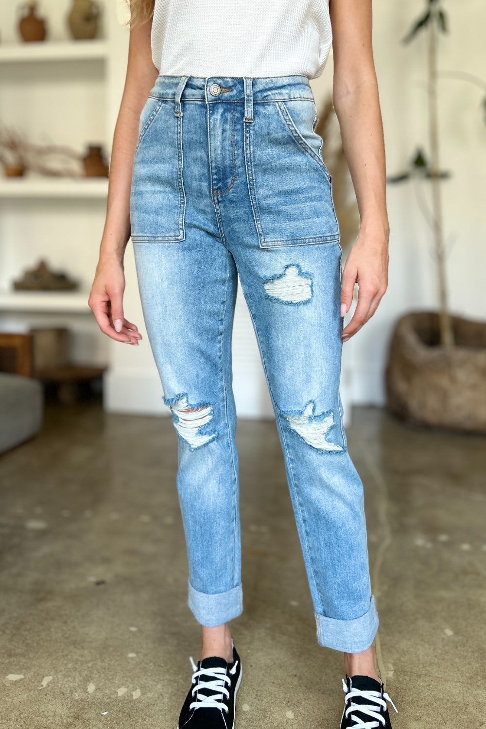 Judy Blue Full Size Distressed Straight Jeans with Patch PocketsThese distressed straight jeans feature stylish patch pockets for added flair. The distressed detailing adds a trendy touch to your look. The straight cut offers a f