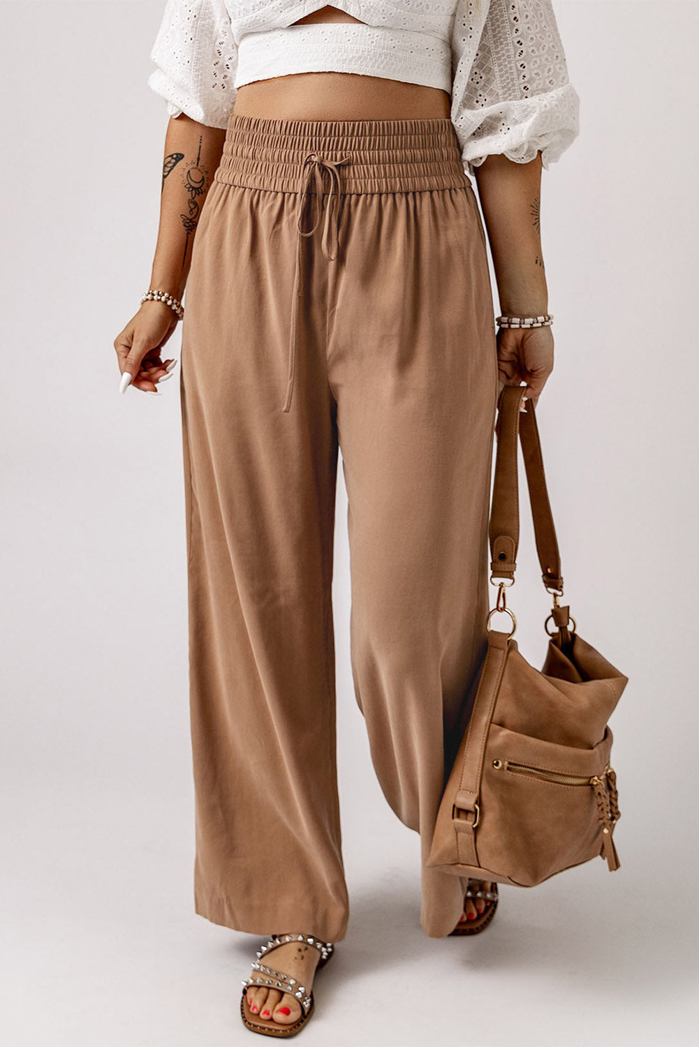 Blue Casual Drawstring Shirred Elastic Waist Wide Leg PantsMaterial:65%Viscose+35%Polyester



		These wide leg pants
are casual and comfy with a loose fit style
	
	
		The smocked waist
design is fashionable and very 