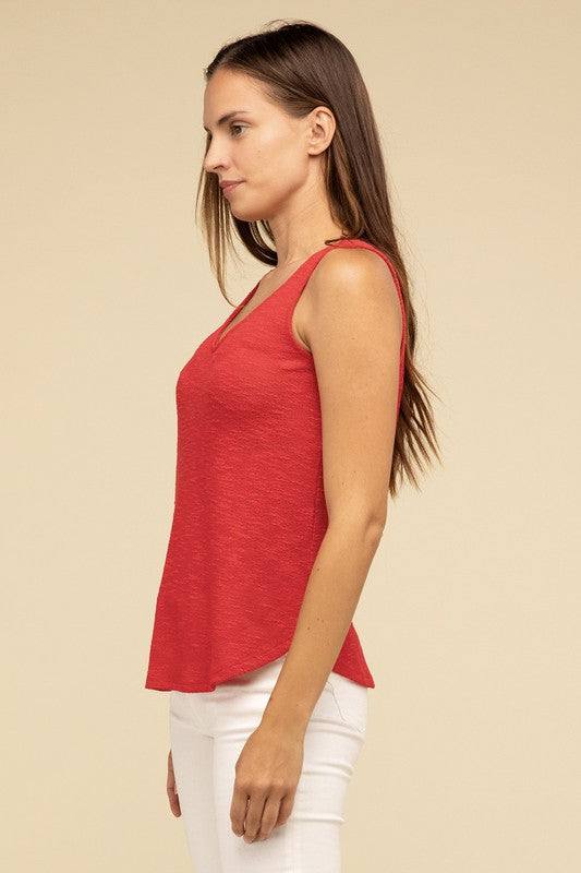 V Neck Sleeveless Cami TopThe V Neck Sleeveless Cami Top is a chic and versatile addition to any wardrobe. Featuring a flattering V neckline and a sleeveless design, this cami top is perfect 