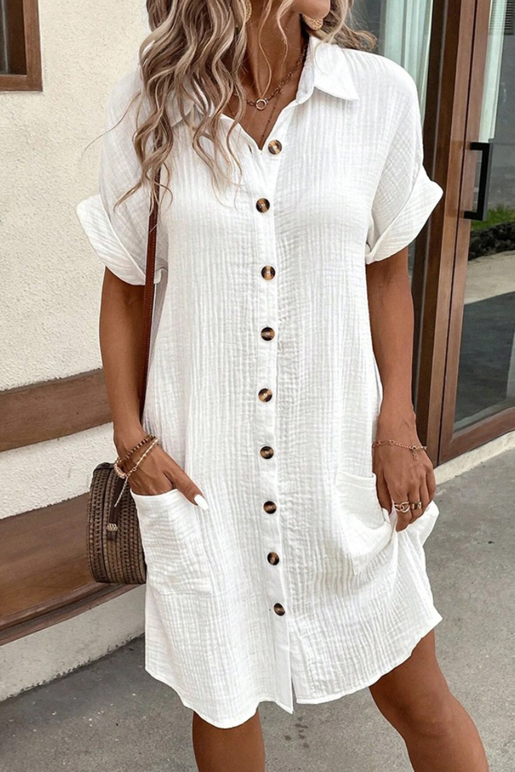 White Solid Color Button Front Roll Up Sleeve Shirt Midi Dress• Crisp and elegant white midi dress with a versatile button front design.
• Features a classic shirt collar and convenient roll-up sleeves for a customizable look.