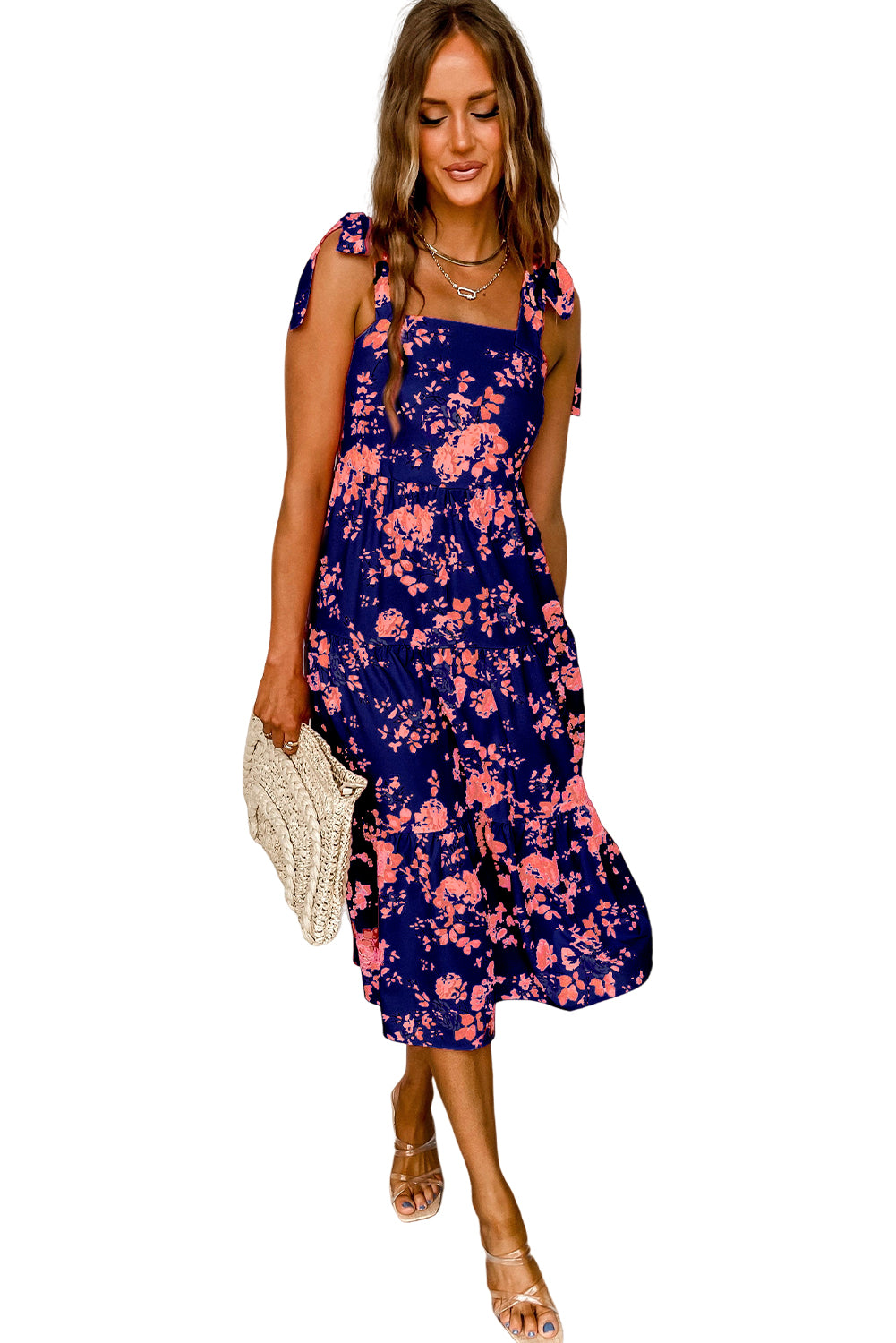 Pink Tie Shoulder Straps Tiered Floral DressMaterial:100%Polyester



		This floral dress is flattering fit to show personal charm
	
	
		The tie shoulder straps are flexible and adjustable
	
	
		The fi