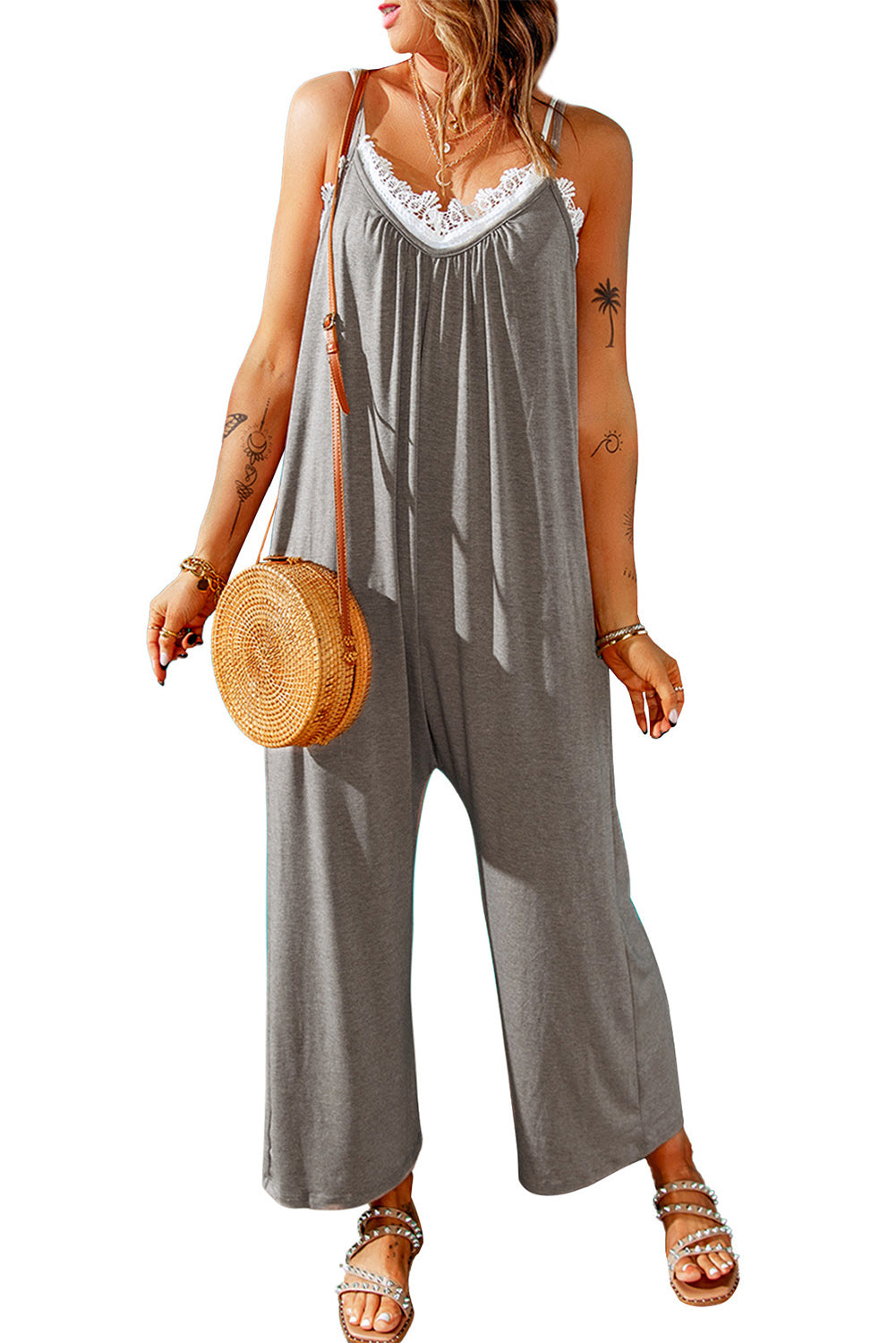 Grey Casual Spaghetti Straps Wide Leg Pocketed JumpsuitsMaterial:Knit


	


		Sleeveless spaghetti straps allow you to expose a large area of skin, making you cooler in summer
	
	
		The wide-leg version is very sty