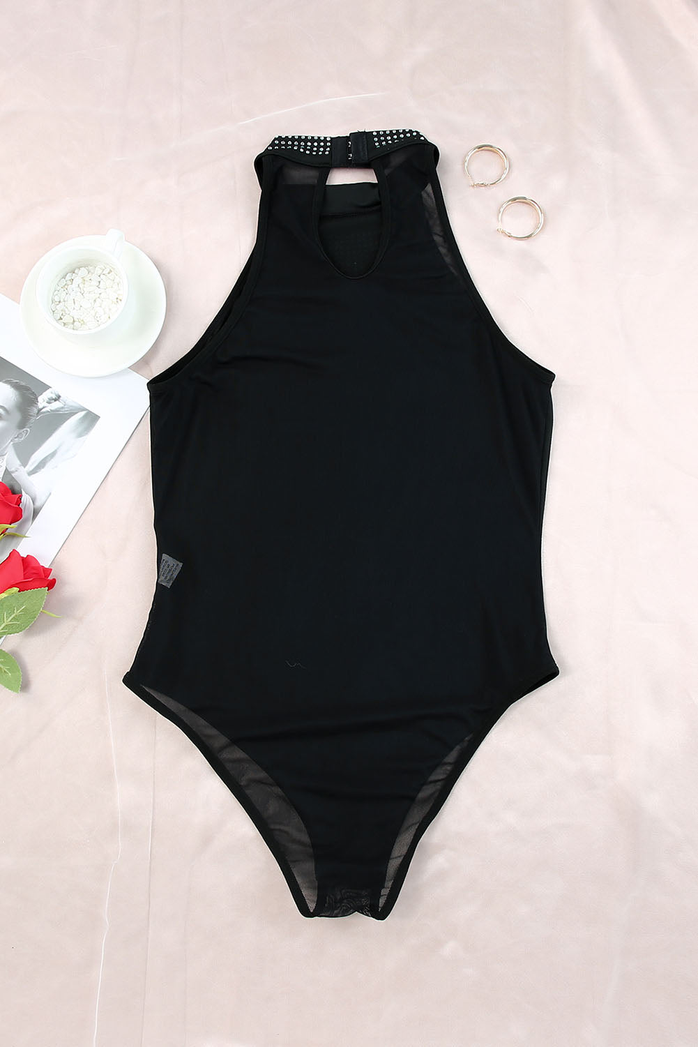 Black Sexy Rhinestone Sleeveless High Neck BodysuitMaterial:95%POLYESTER+5%ELASTANE


	

			The Black High Neck Sleeveless Diamante Bodysuit features a glamorous design that's perfect for a night out.
		
		
			