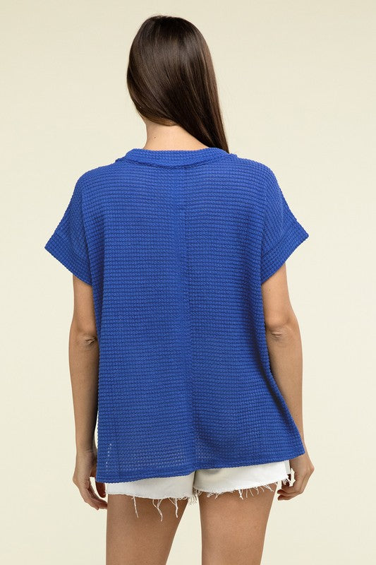 Brushed Waffle Exposed-Seam Short Sleeve TopElevate your casual wardrobe with this Brushed Waffle Top, featuring side slits, exposed seam details, and a stylish hi-low hem. Perfect for a relaxed yet trendy loo