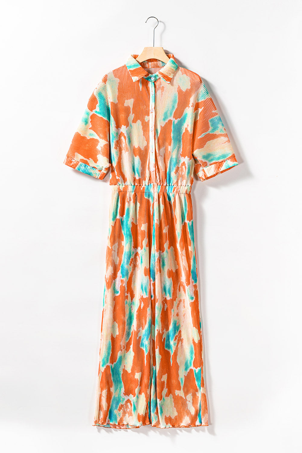 Multicolor Bohemian Tie Dye Pleated Wide Leg JumpsuitMaterial:100%Polyester



		•Made of soft and flowy fabric for comfort and movement.
	
	
		•Features a pleated design for a flattering fit.
	
	
		•Wide leg c