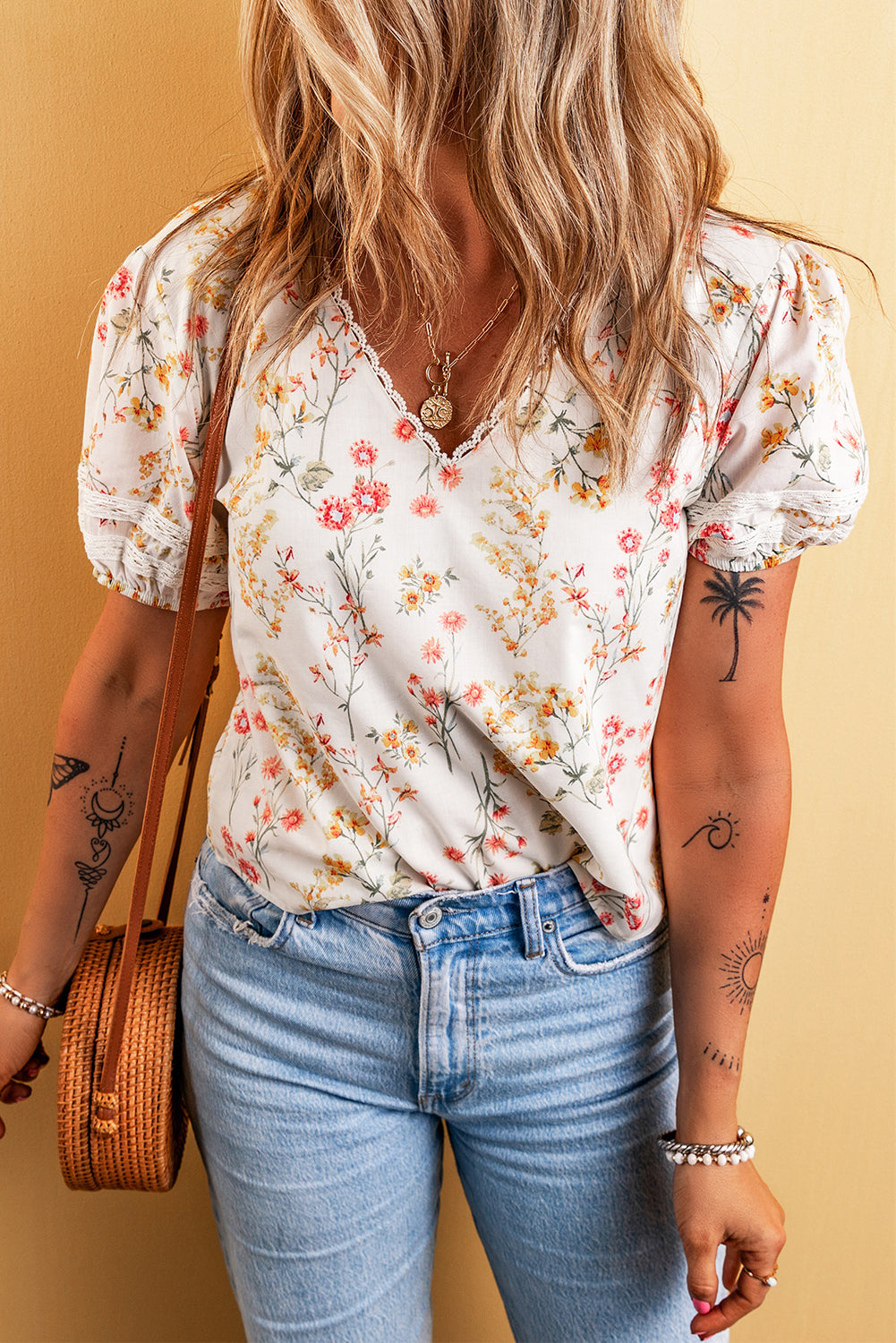 Beige Boho Floral Lace Trim Short Sleeve BlouseMaterial:100%Polyester

• Embrace bohemian chic with this blouse, featuring intricate lace details that add a touch of elegance to your look.
• The V-neck design o