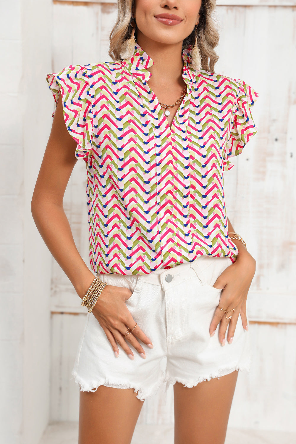 Multicolor Chevron Print Frill V Neck Ruffle BlouseMaterial:100%Polyester



		Be a style icon in this printed blouse
	
	
		This stylish top is featured with chevron print all over
	
	
		It has a ruffled notc