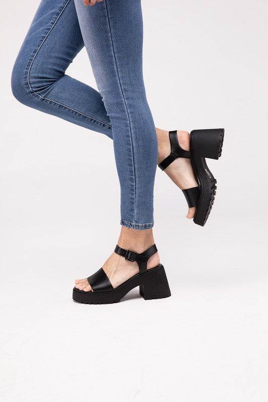 BOOMER-S Platform Heel SandalsIntroducing our Boomer-S Platform Heel Sandals with Ankle Straps, the perfect blend of style and comfort for your summer wardrobe. These sandals feature a trendy pla